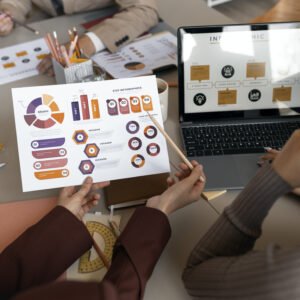 high angle people working with laptop